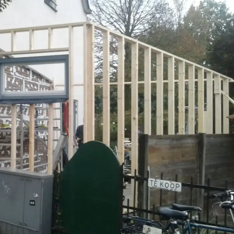Uitbouw met houtskeletbouw en sedum dak in Assendorp – foto 5